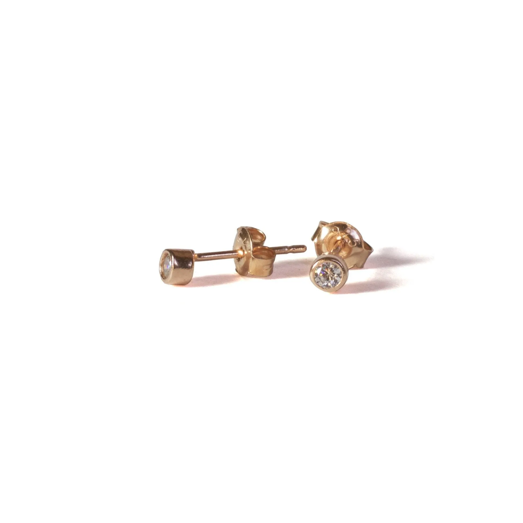 One Cubic Zirconia Stud Earrings