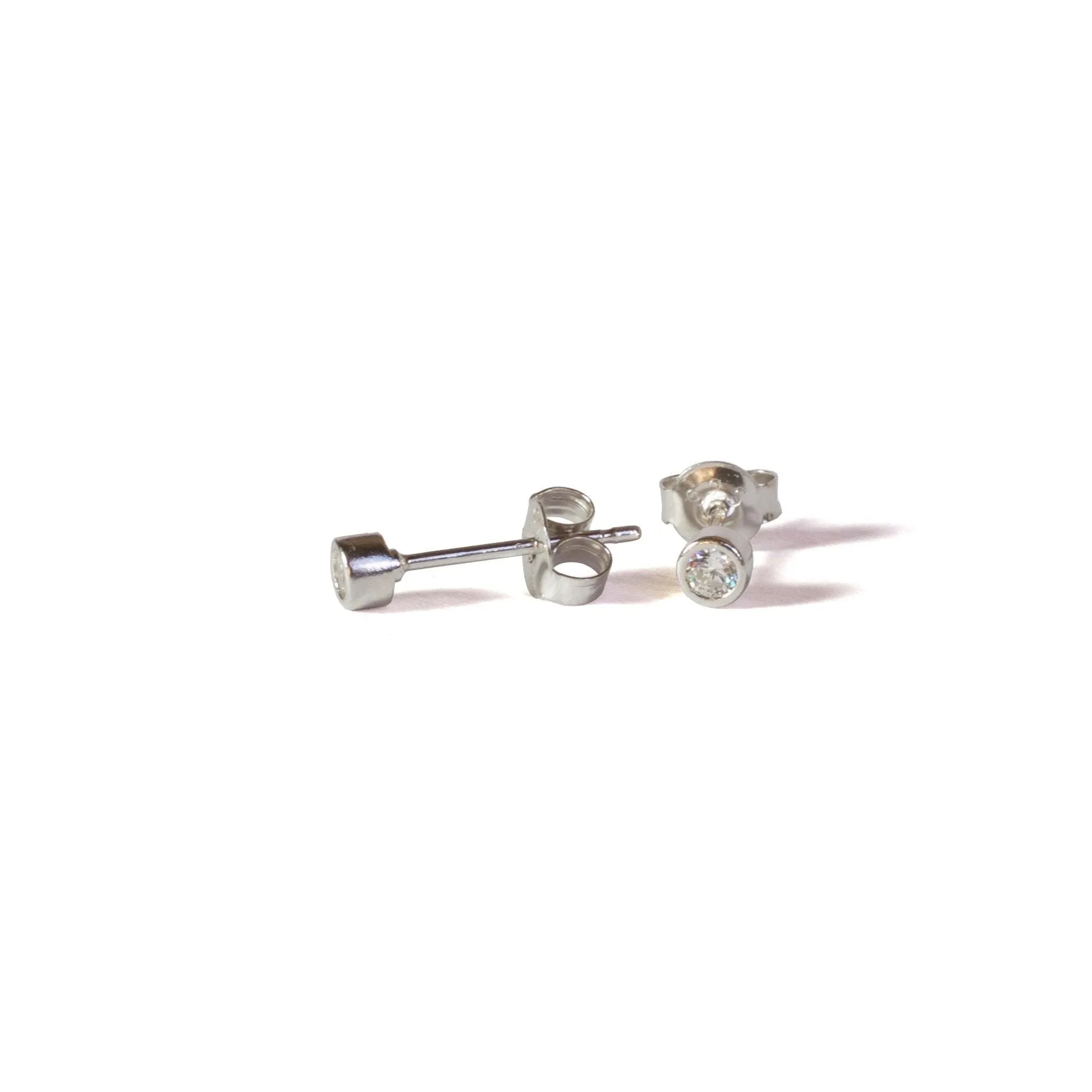 One Cubic Zirconia Stud Earrings