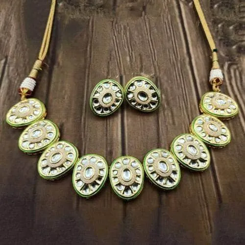 Oval Cut Kundan Necklace And Earring Set